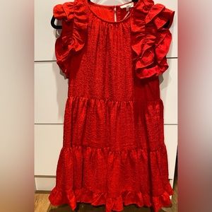 Brand new with tags beautiful red ruffle sleeve dress. Size small.
